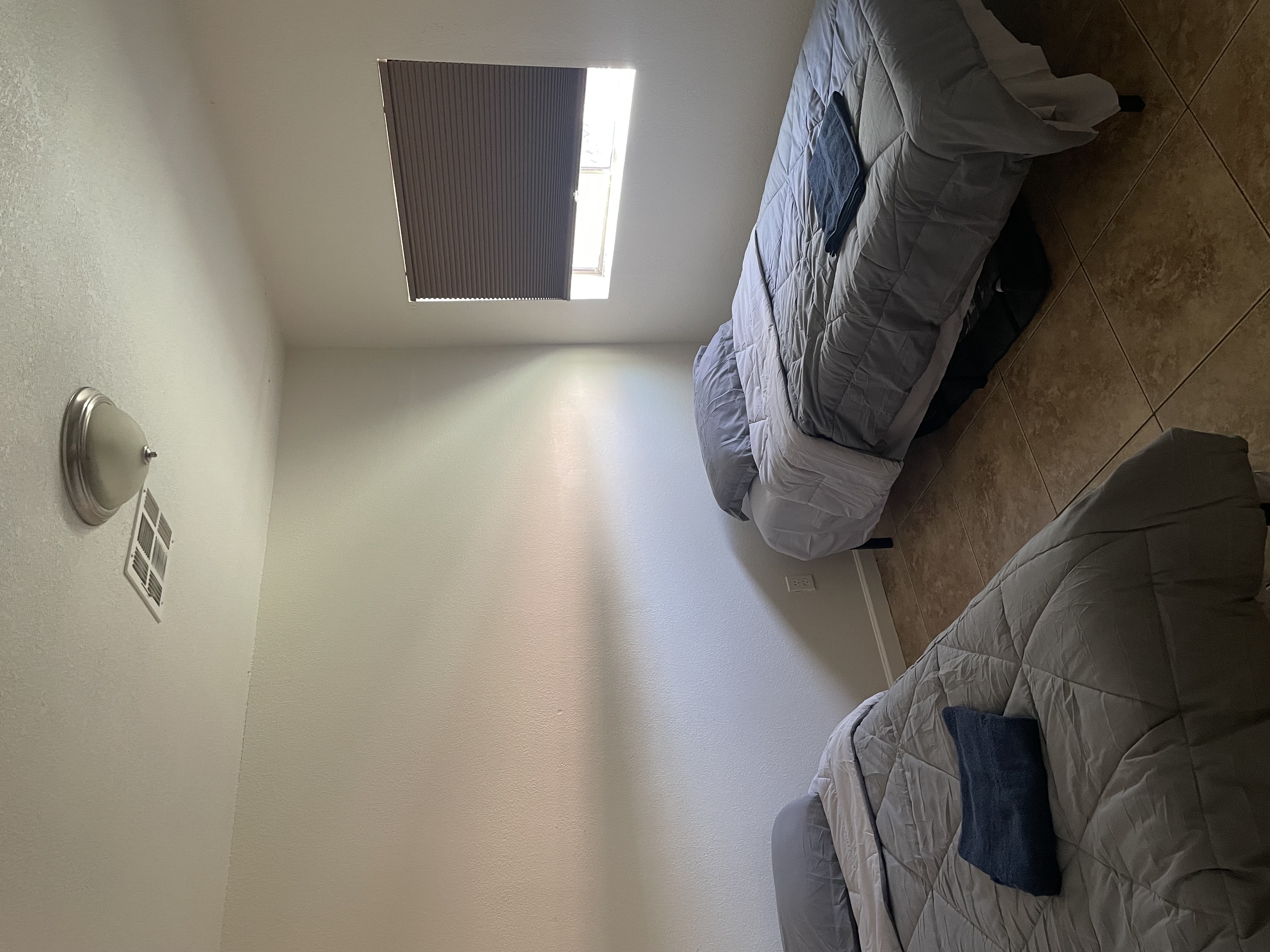 Bedroom with two twin beds.